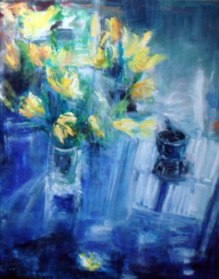 Yellow tulips on blue table